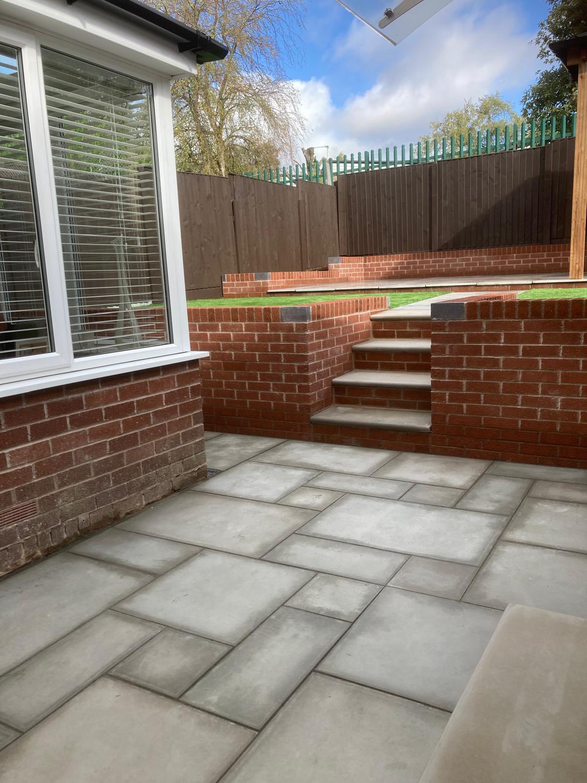 Complete outdoor makeover with paving and planting in Kearsley